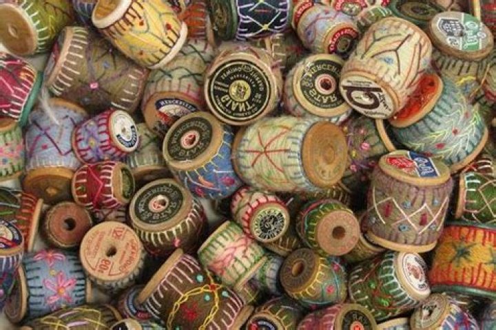 Are old wooden thread spools valuable?