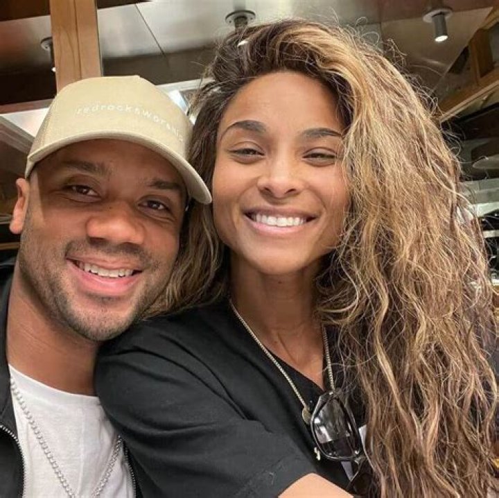 Ashton Meem with her husband and friend Elise and Golden Tate