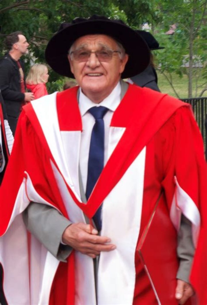 Charlie receiving honorary Ph.D. degree