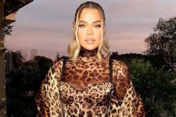 Curvy Khloe Kardashian wears a unflattering pair of stonewash leggings to Voyeur nightclub