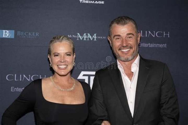 Elizabeth Lyn Vargas with her ex-husband Bernt Bodal to her left during a dinner party.