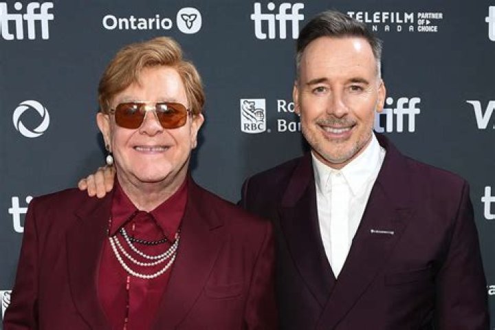 Elton John and David Furnish with their two kids.