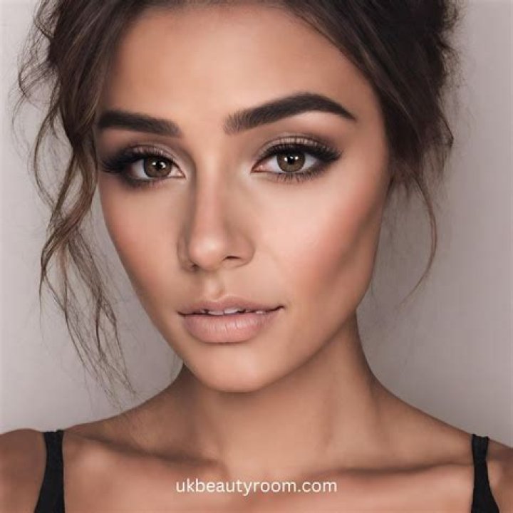 flaunting his amazing makeup skills.