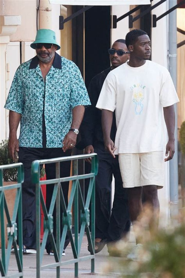 Harvey Jr. posing at the middle of the road. Know about Harvey Jr.'s personal life, girlfriend, marriage