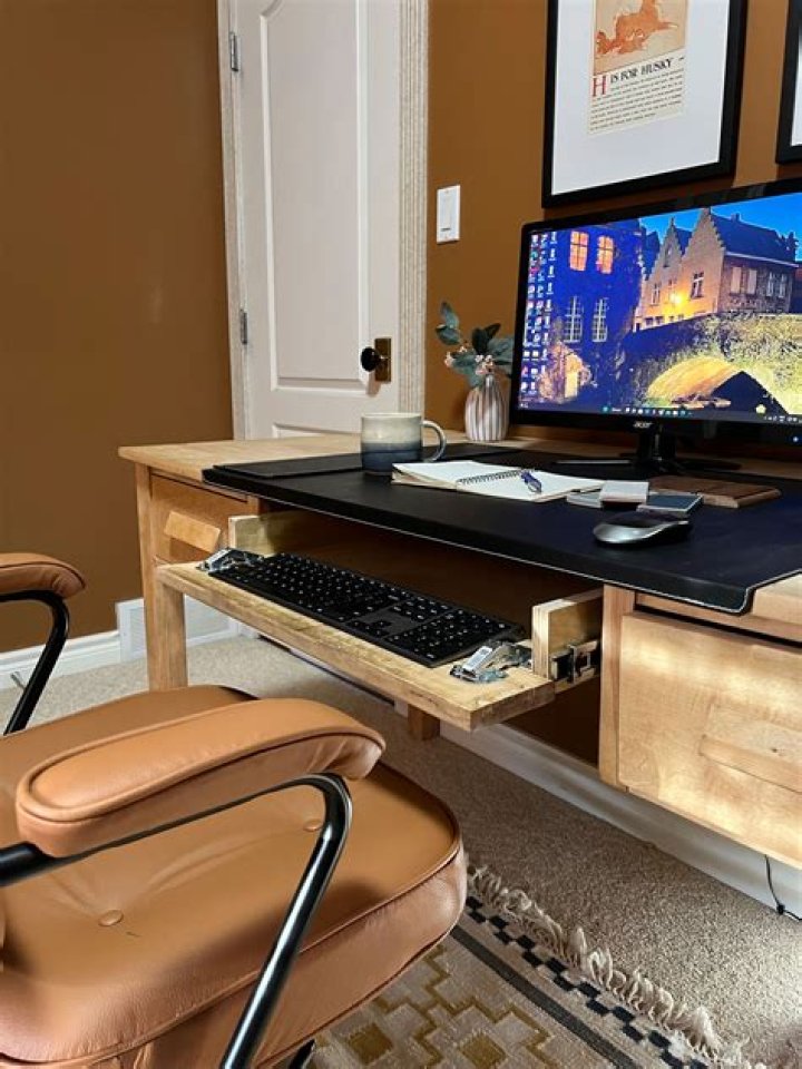 How do you change a keyboard tray to a drawer?
