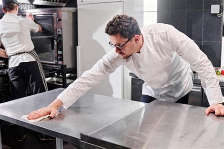 How do you clean a stainless steel kitchen table?