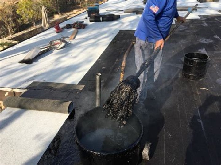 How much does it cost to hot mop a roof?