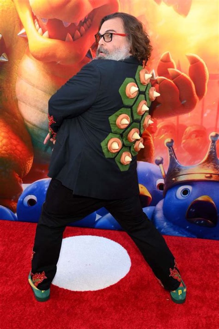 Jack Black posing at the Super Mario movie Red Carpet.