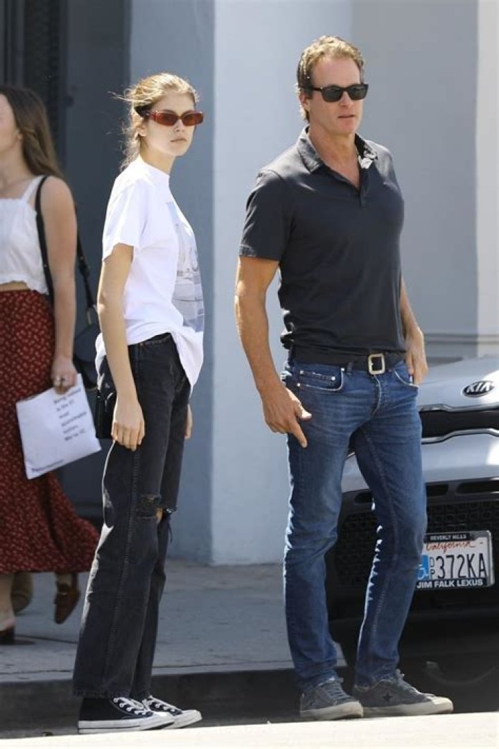 Kaia Gerber and Rande Gerber take in the Chicago Bulls vs New York Knicks game