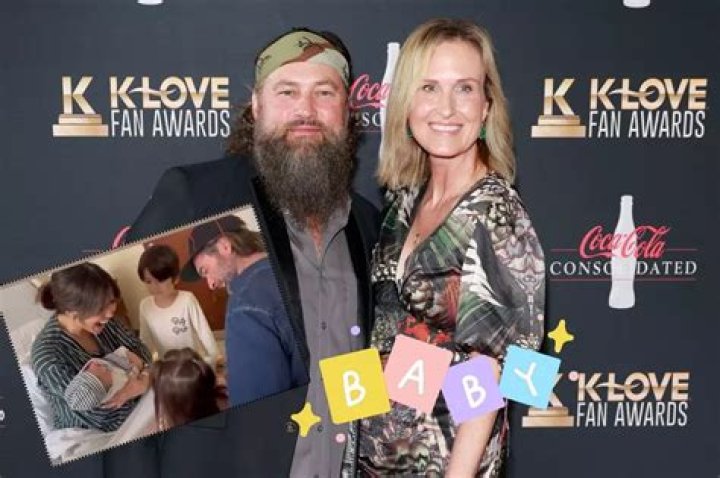 Korie Howard Robertson and Wille Robertson wearing hankey on his head and Korie in her brown hair