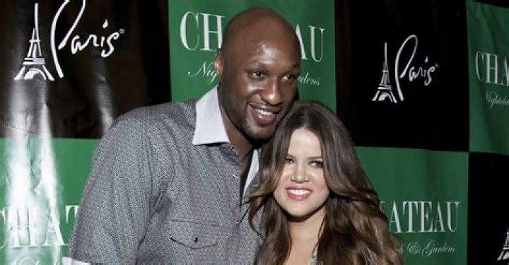 Lamar Odom leads his wife Khloe Kardashian out of Guys & Dolls nightclub in LA