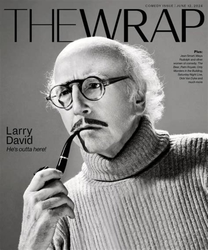 Larry David, photographed driving his BMW i3.