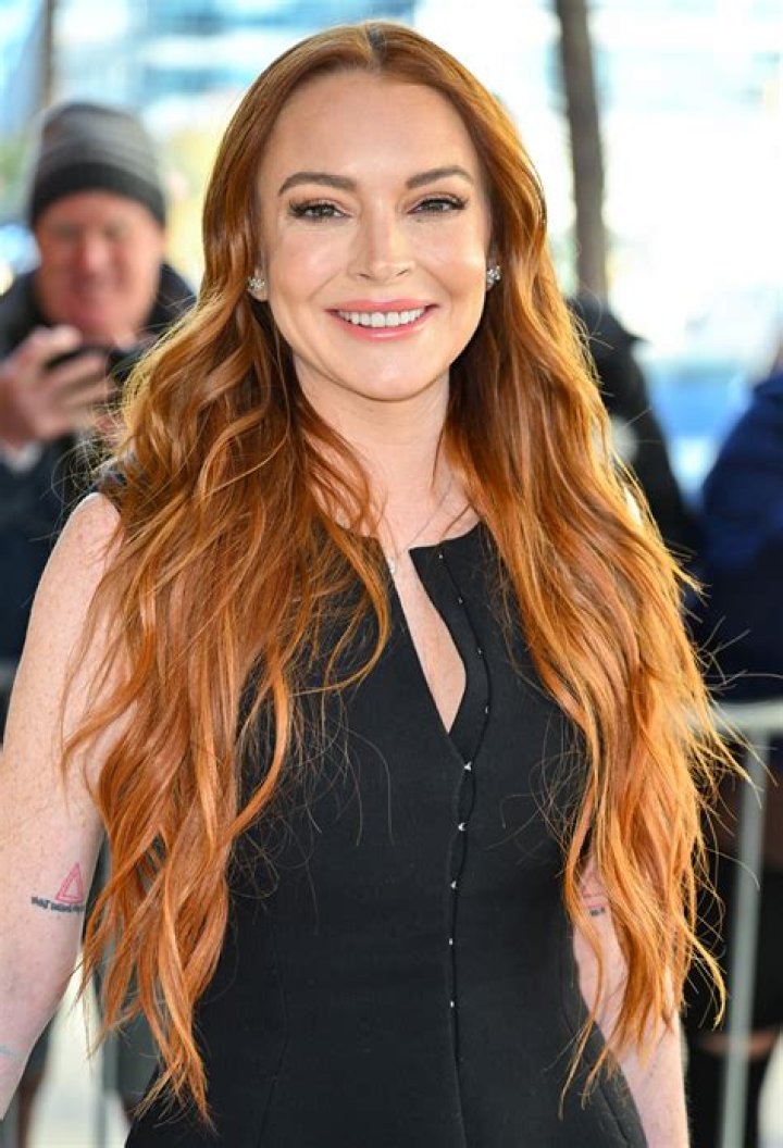 Lindsay Lohan on vacation with Samantha on the beach.