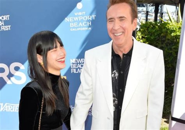 (L-R) Riko Shibata and Nicolas Cage attend the 2024 Vanity Fair Oscar Party Hosted By Radhika Jones at Wallis Annenberg Center for the Performing A...