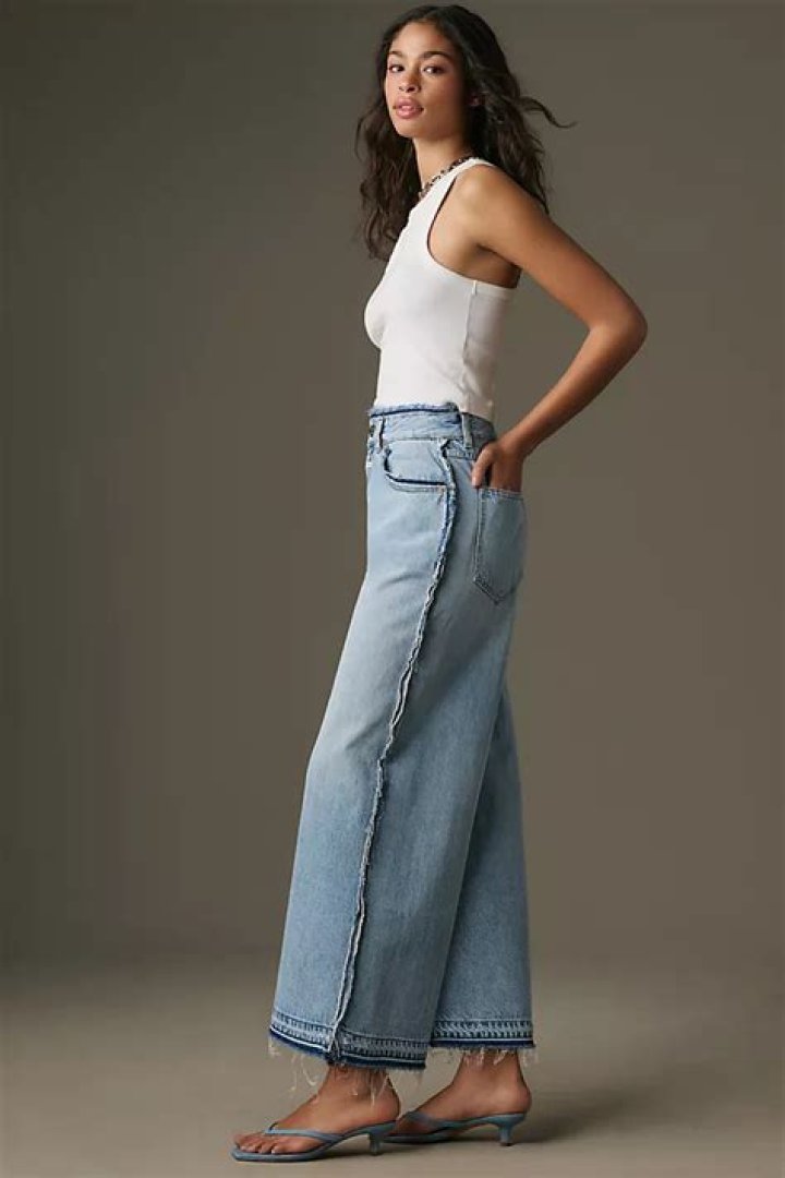 Lyna in jeans and high heels