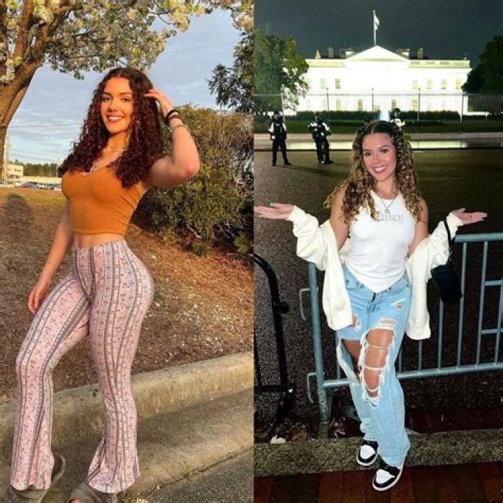 McKinzie Valdez posing with her luxurious car Mercedes-Benz W 176. 