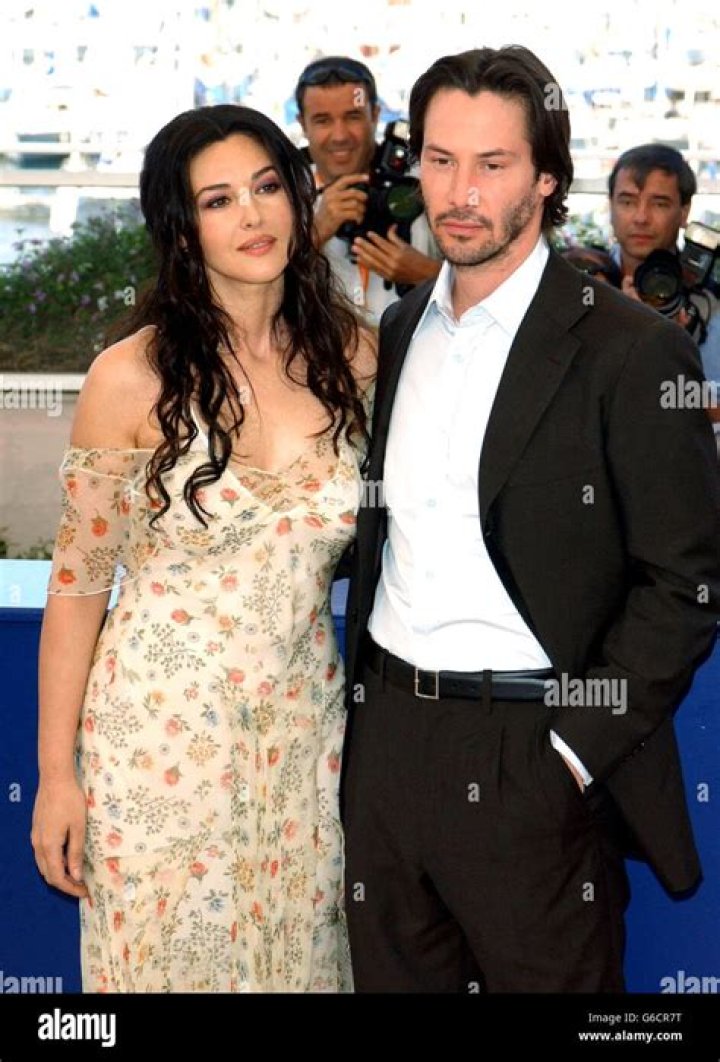 Monica Bellucci with Keanu Reeves at some film festival.