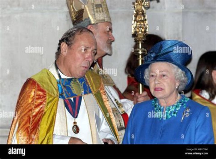 Queen Elizabeth II speaks with Prince Harry, Duke of Sussex as they leave after the wedding of Lady Gabriella Windsor to Thomas Kingston at St Geor...