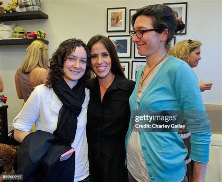 Sara Gilbert and Allison Adler with their children