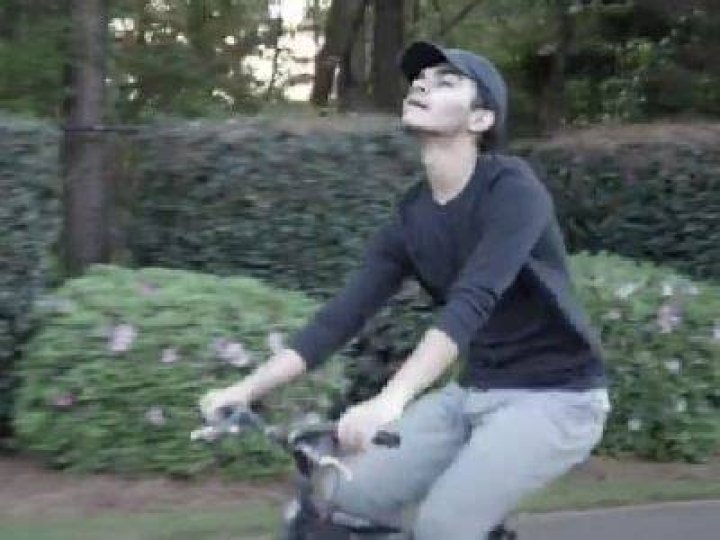 Sauriyan Sapkota is riding a bicycle in the scene.