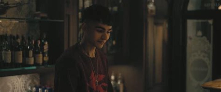 Sauriyan Sapkota is wearing a brown suit in the picture.