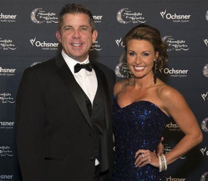 Skylene Montgomery with her husband Sean Payton posing for a photo shoot.