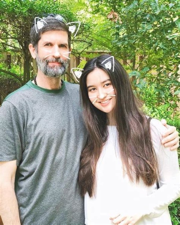 Stephanie with her father and her husband