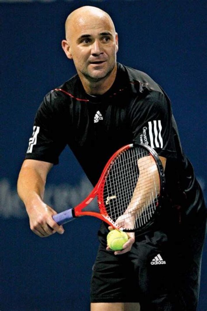 Tennis Player Andre Agassi Smiles Holding A Racket November 15 1991 In USA Agassi Made