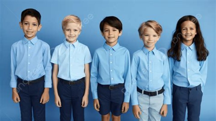 three sons are wearing blue t-shirt and half pants.