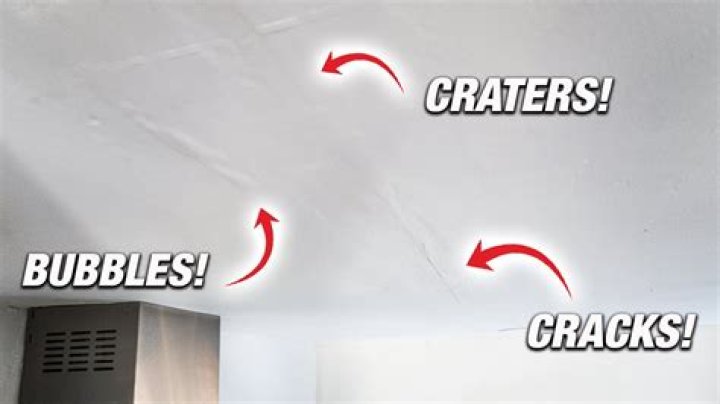 What causes drywall to bubble?