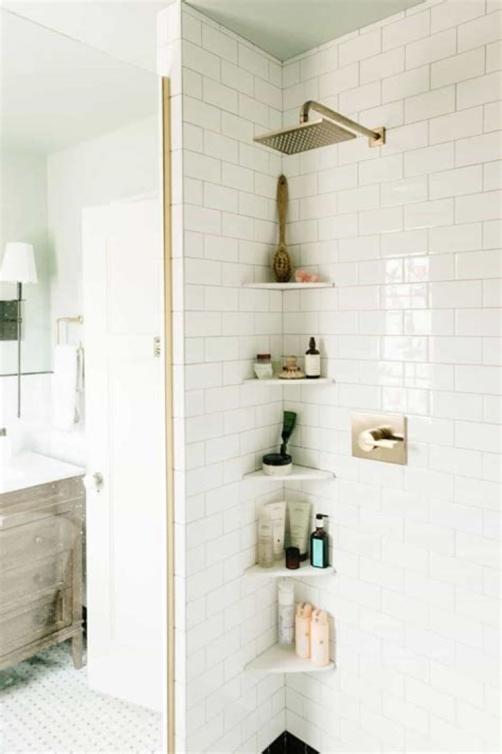 Where should shower shelves be placed?